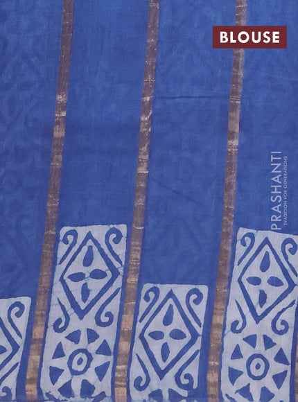 Semi chanderi saree blue with allover zari strips & batik butta prints in borderless style