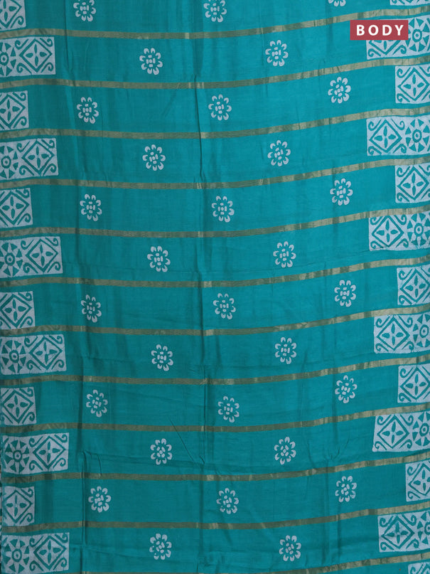 Semi chanderi saree teal green with allover zari strips & batik butta prints in borderless style