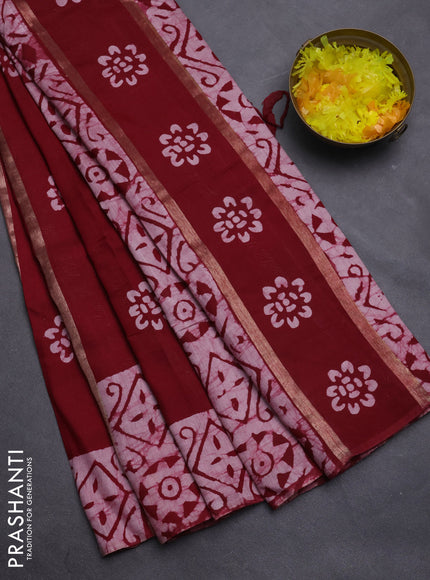 Semi chanderi saree maroon with allover zari strips & batik butta prints in borderless style