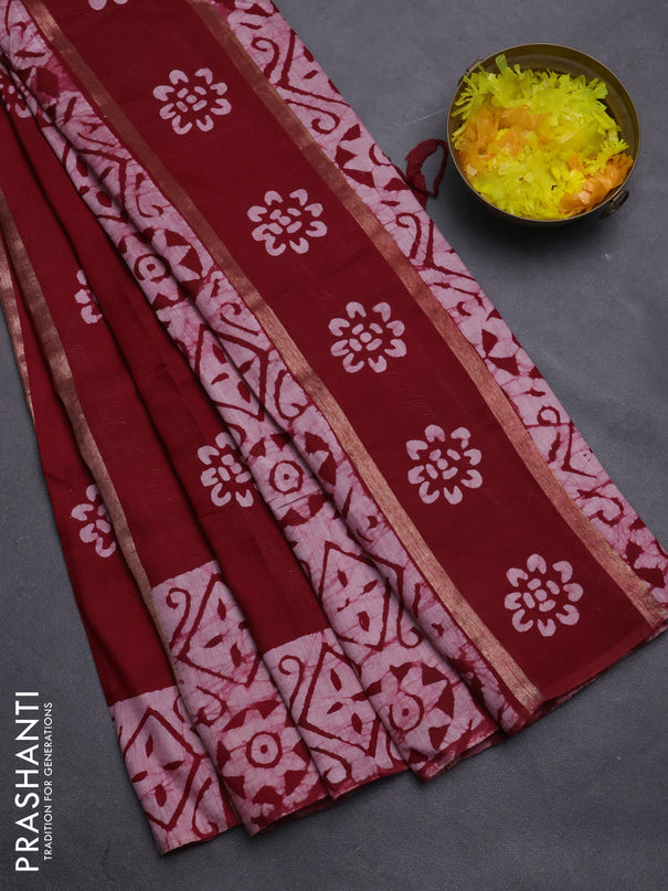 Semi chanderi saree maroon with allover zari strips & batik butta prints in borderless style