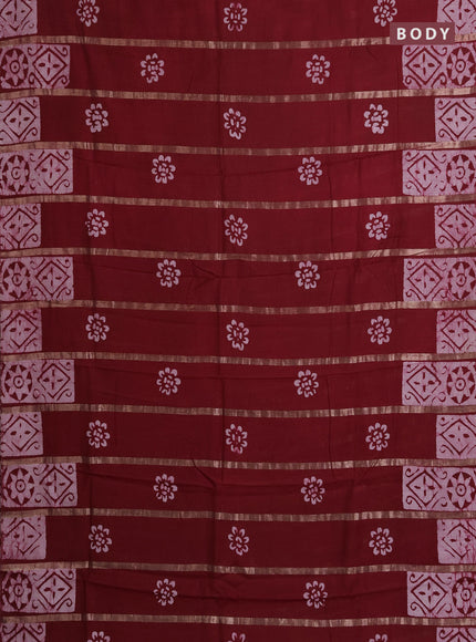Semi chanderi saree maroon with allover zari strips & batik butta prints in borderless style
