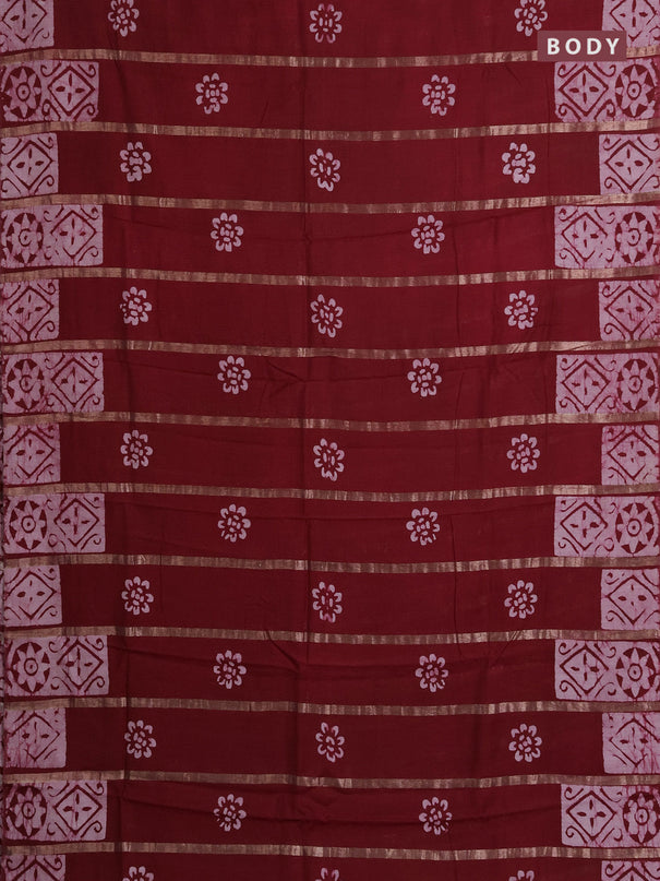 Semi chanderi saree maroon with allover zari strips & batik butta prints in borderless style