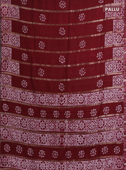 Semi chanderi saree maroon with allover zari strips & batik butta prints in borderless style