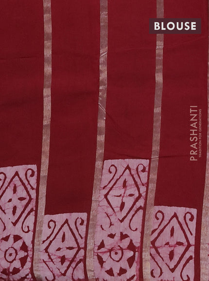 Semi chanderi saree maroon with allover zari strips & batik butta prints in borderless style