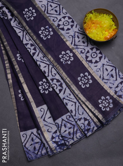 Semi chanderi saree navy blue with allover zari strips & batik butta prints in borderless style
