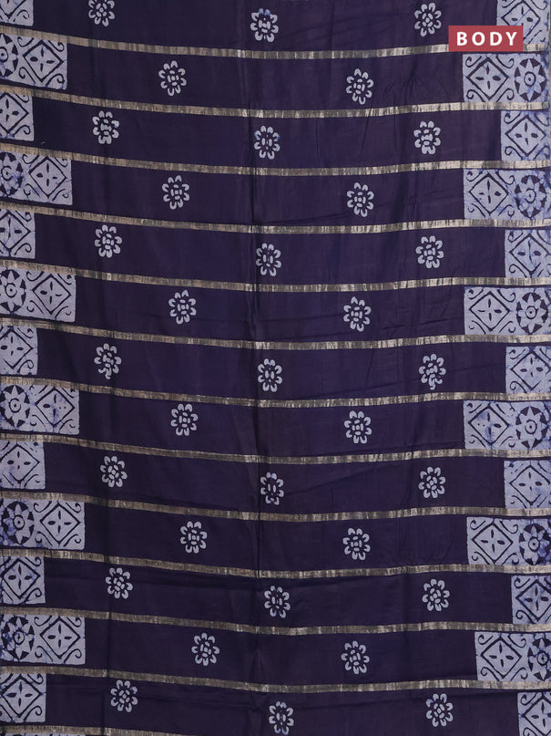 Semi chanderi saree navy blue with allover zari strips & batik butta prints in borderless style