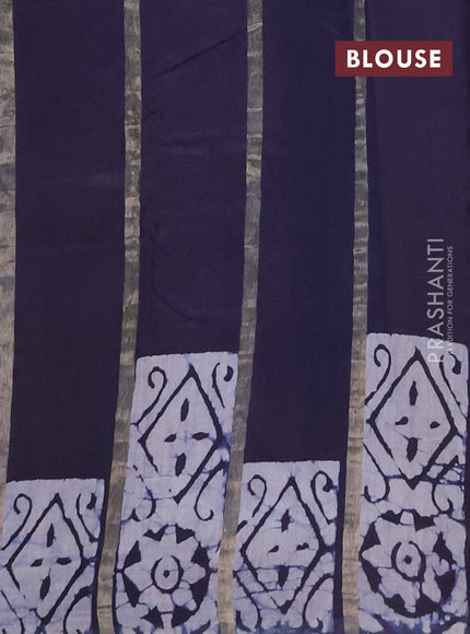Semi chanderi saree navy blue with allover zari strips & batik butta prints in borderless style
