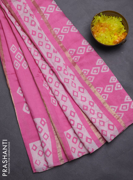 Semi chanderi saree light pink with allover zari strips & batik butta prints in borderless style