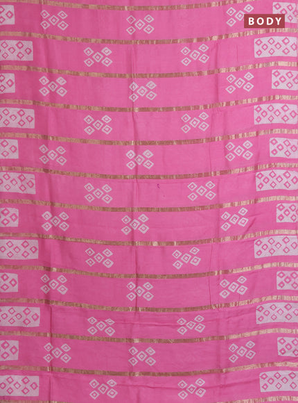 Semi chanderi saree light pink with allover zari strips & batik butta prints in borderless style