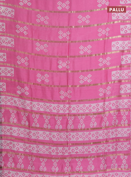 Semi chanderi saree light pink with allover zari strips & batik butta prints in borderless style