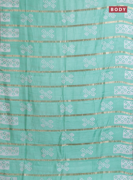 Semi chanderi saree teal green with allover zari strips & batik butta prints in borderless style