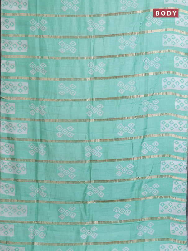 Semi chanderi saree teal green with allover zari strips & batik butta prints in borderless style