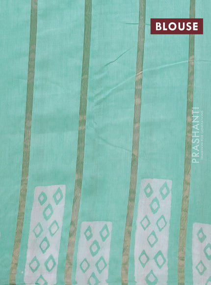 Semi chanderi saree teal green with allover zari strips & batik butta prints in borderless style