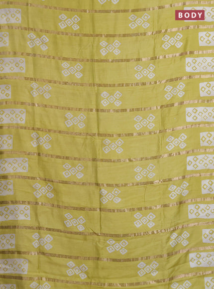Semi chanderi saree pista green with allover zari strips & batik butta prints in borderless style