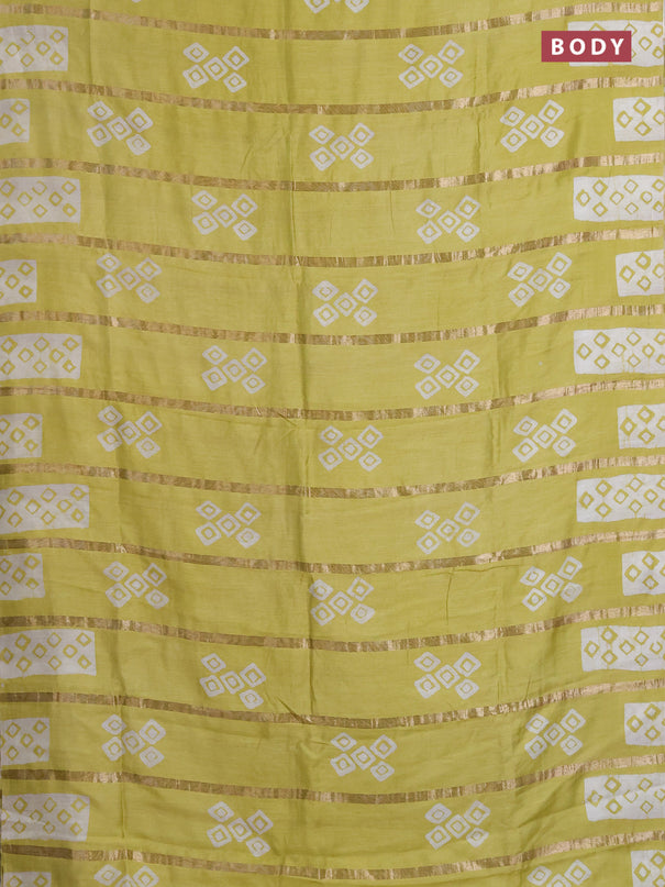 Semi chanderi saree pista green with allover zari strips & batik butta prints in borderless style