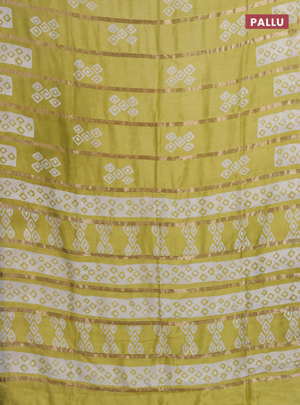 Semi chanderi saree pista green with allover zari strips & batik butta prints in borderless style