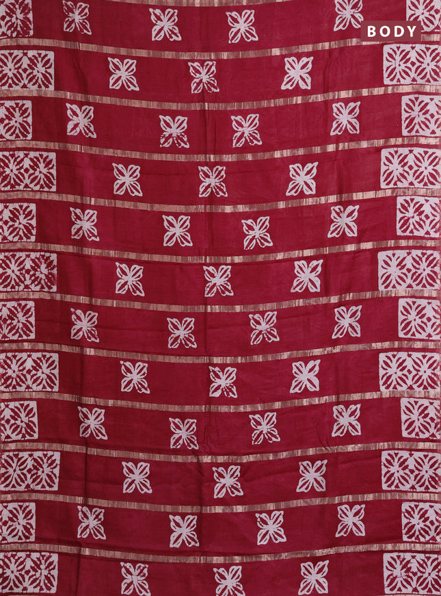 Semi chanderi saree maroon with allover zari strips & batik butta prints in borderless style