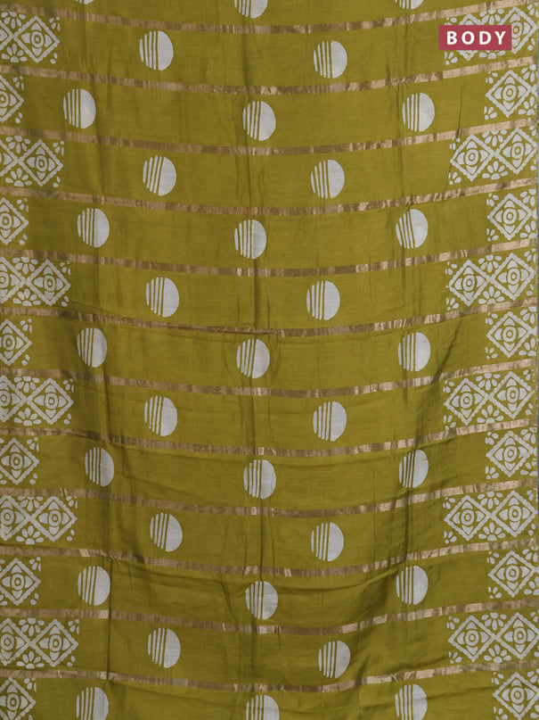 Semi chanderi saree mehendi green with allover zari strips & batik butta prints in borderless style