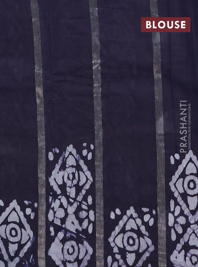 Semi chanderi saree deep navy blue with allover zari strips & batik butta prints in borderless style