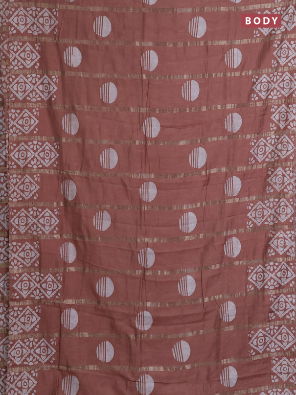 Semi chanderi saree pastel brown with allover zari strips & batik butta prints in borderless style