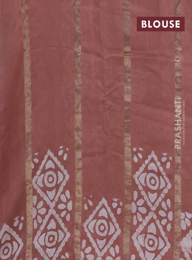 Semi chanderi saree pastel brown with allover zari strips & batik butta prints in borderless style