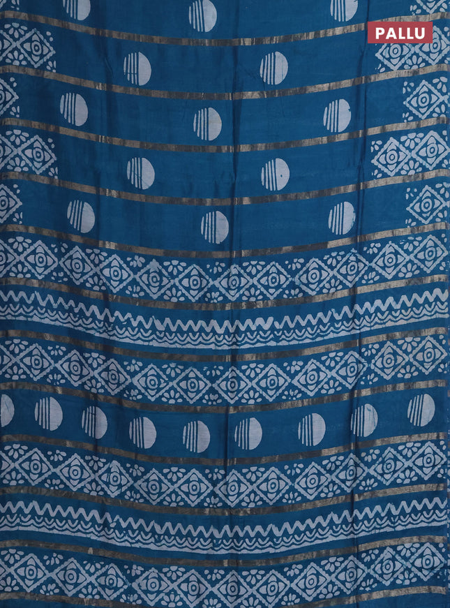 Semi chanderi saree peacock green with allover zari strips & batik butta prints in borderless style