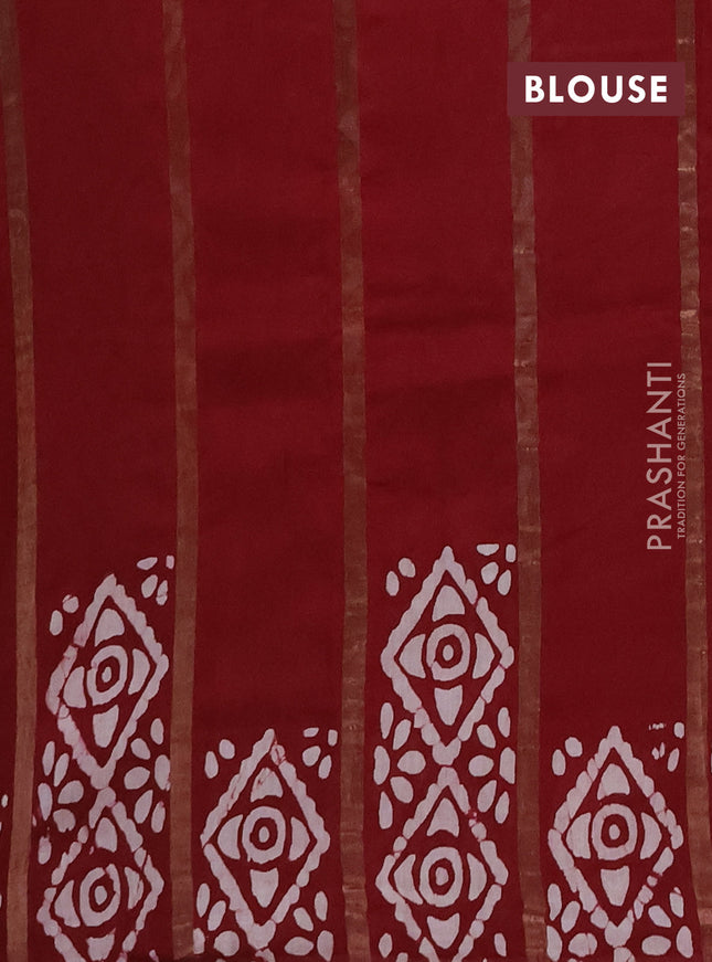 Semi chanderi saree maroon with allover zari strips & batik butta prints in borderless style