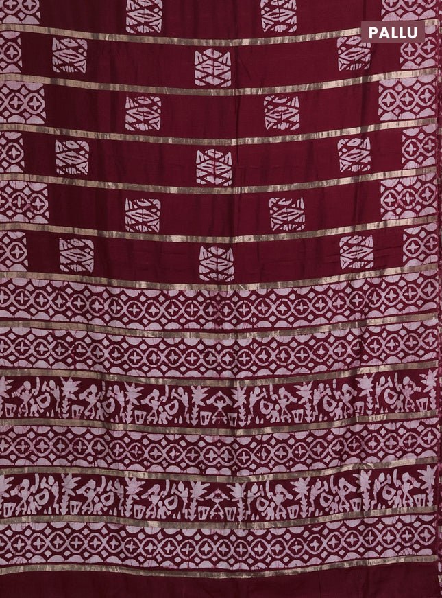 Semi chanderi saree maroon with allover zari strips & batik butta prints in borderless style