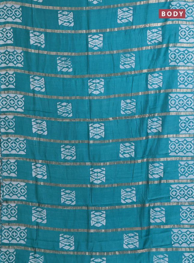 Semi chanderi saree teal green with allover zari strips & batik butta prints in borderless style