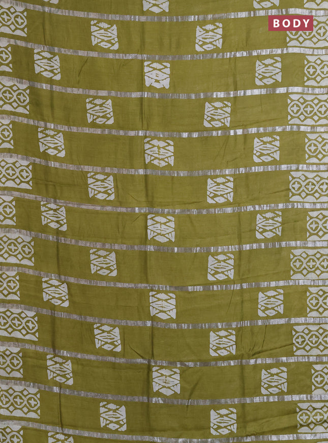 Semi chanderi saree mehendi green with allover zari strips & batik butta prints in borderless style
