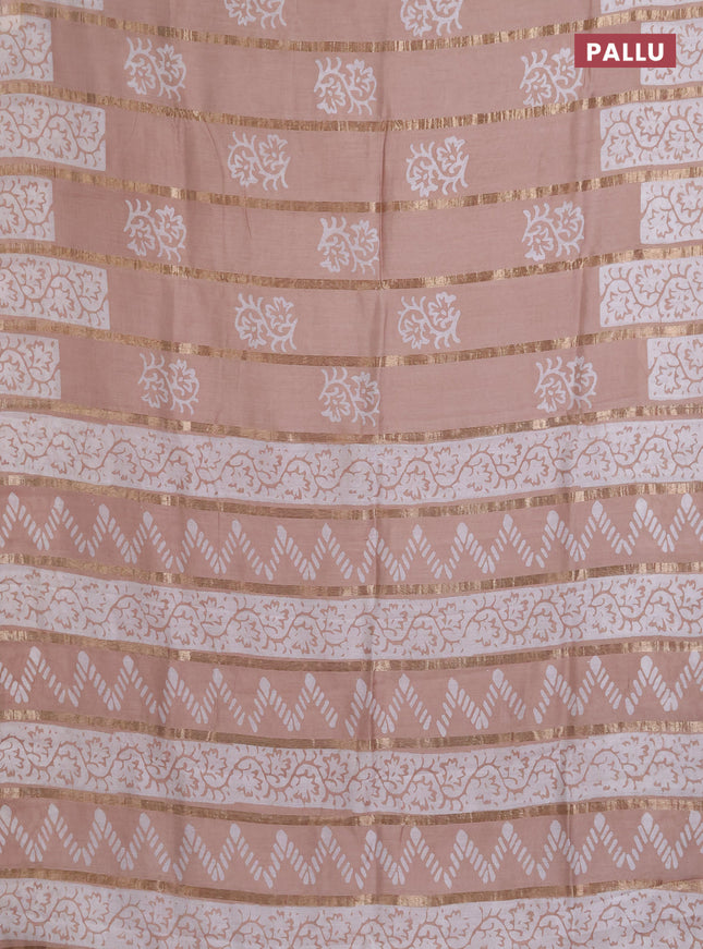 Semi chanderi saree sandal with allover zari strips & batik butta prints in borderless style