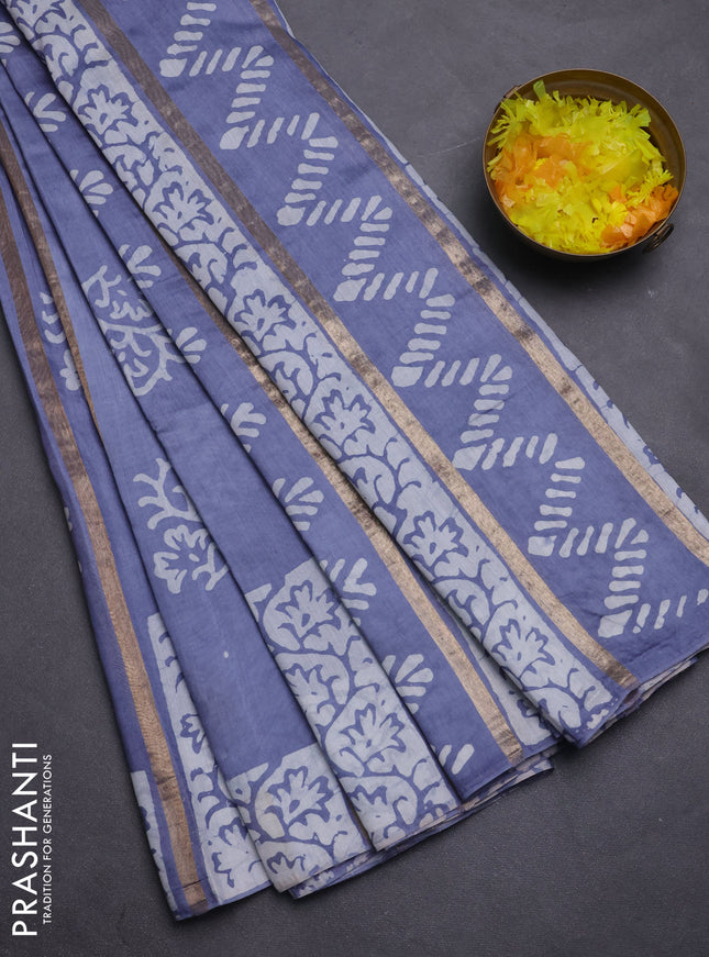 Semi chanderi saree grey with allover zari strips & batik butta prints in borderless style