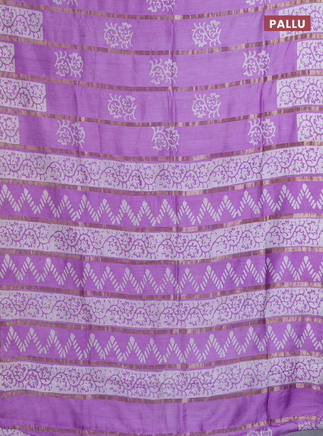 Semi chanderi saree laveder shade with allover zari strips & batik butta prints in borderless style