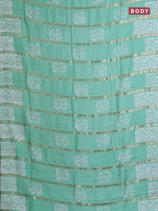 Semi chanderi saree teal green with allover zari strips & batik butta prints in borderless style