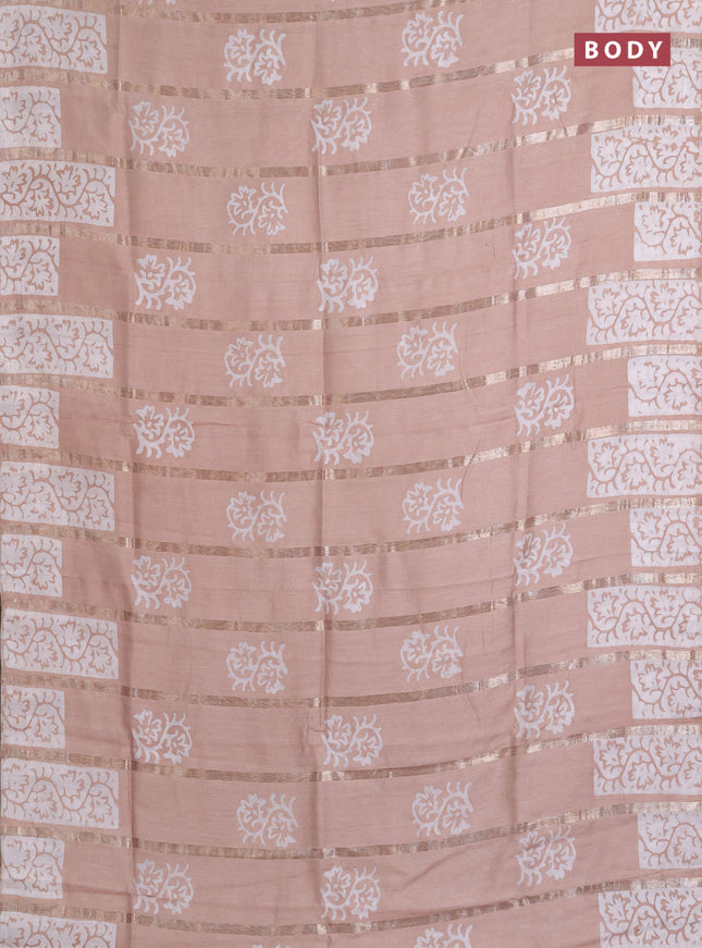 Semi chanderi saree pastel brown with allover zari strips & batik butta prints in borderless style
