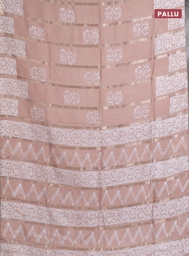 Semi chanderi saree pastel brown with allover zari strips & batik butta prints in borderless style