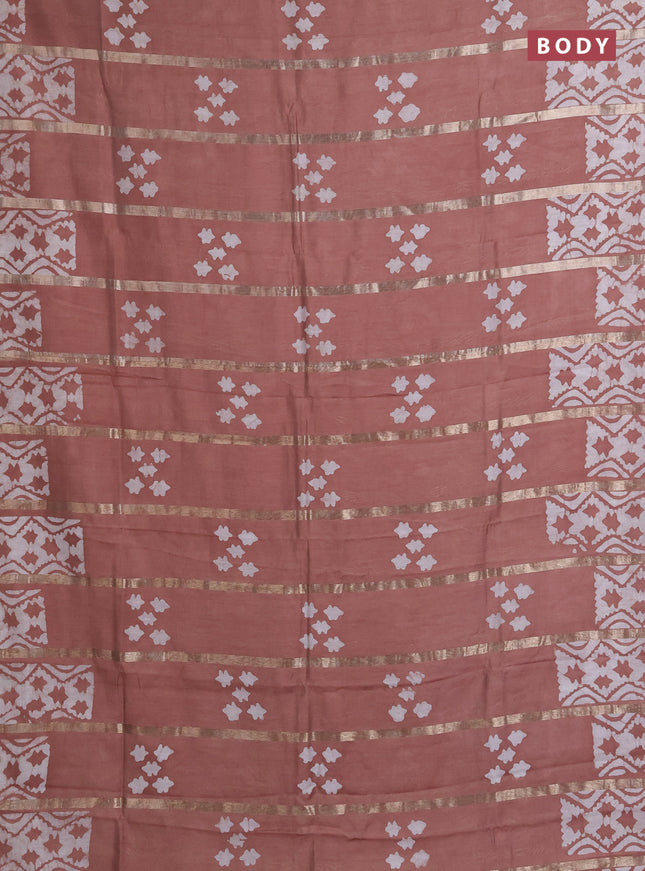 Semi chanderi saree pastel brown with allover zari strips & batik butta prints in borderless style