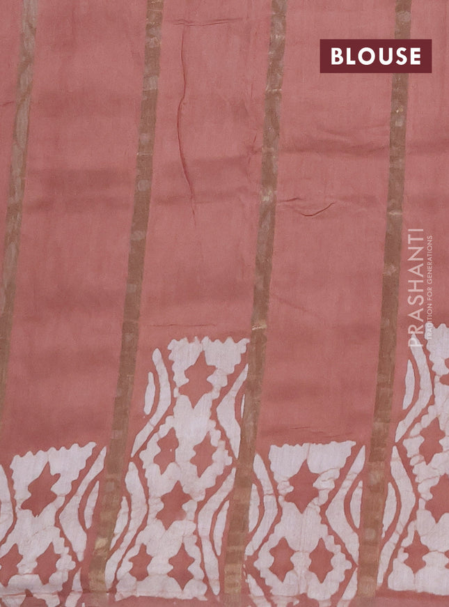 Semi chanderi saree pastel brown with allover zari strips & batik butta prints in borderless style