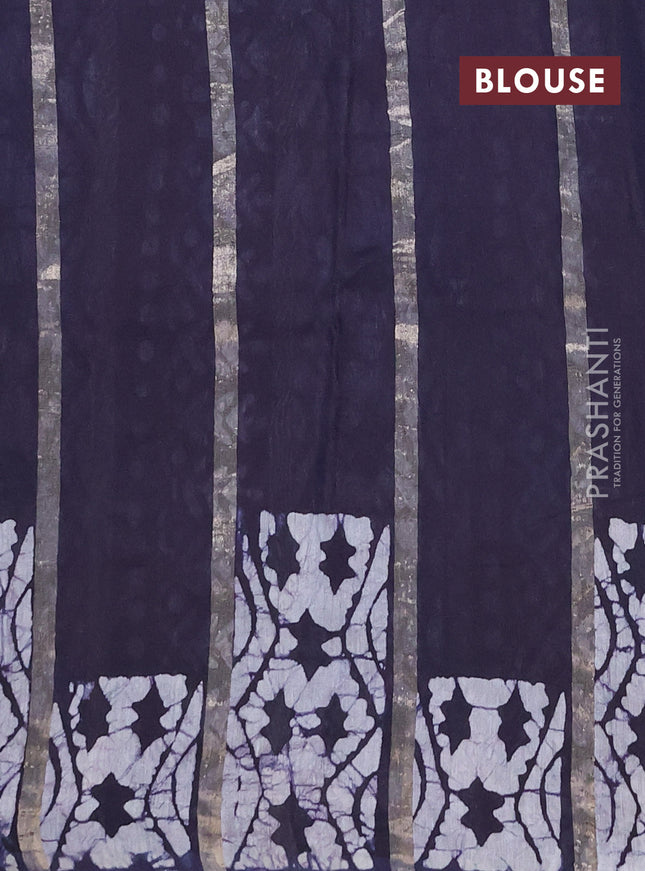 Semi chanderi saree navy blue with allover zari strips & batik butta prints in borderless style