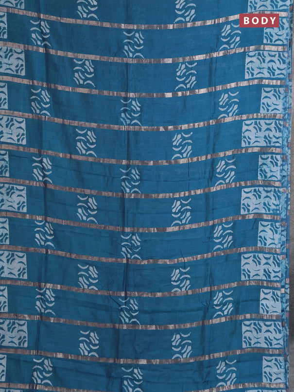 Semi chanderi saree peacock green with allover zari strips & batik butta prints in borderless style