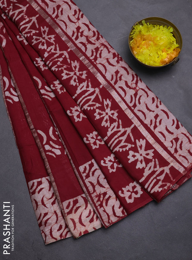 Semi chanderi saree maroon with allover zari strips & batik butta prints in borderless style