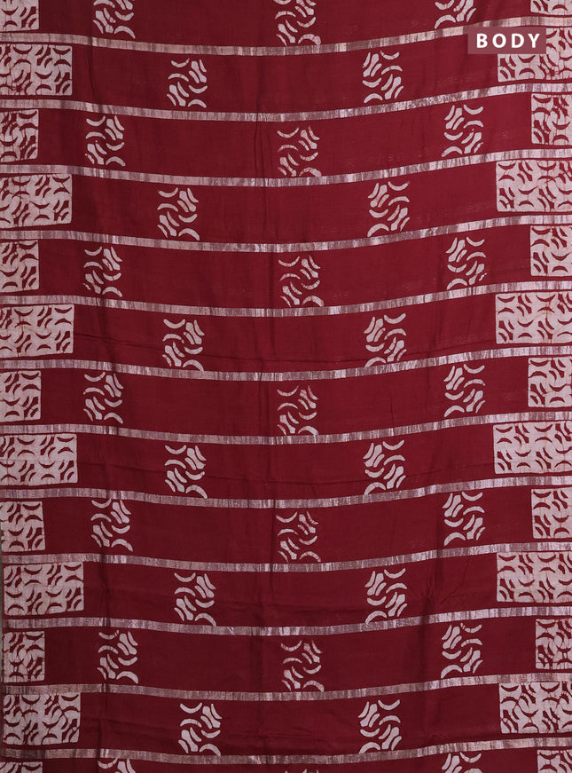 Semi chanderi saree maroon with allover zari strips & batik butta prints in borderless style