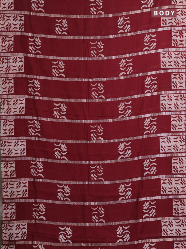 Semi chanderi saree maroon with allover zari strips & batik butta prints in borderless style