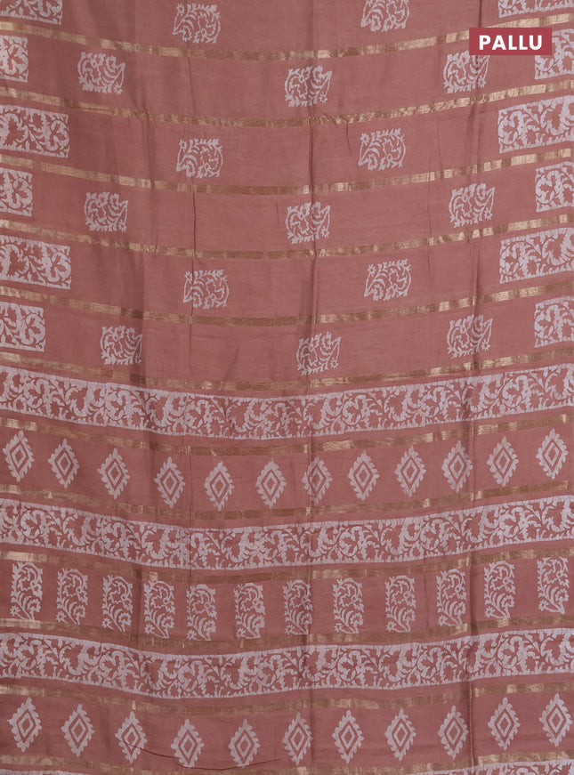 Semi chanderi saree pastel brown with allover zari strips & batik butta prints in borderless style
