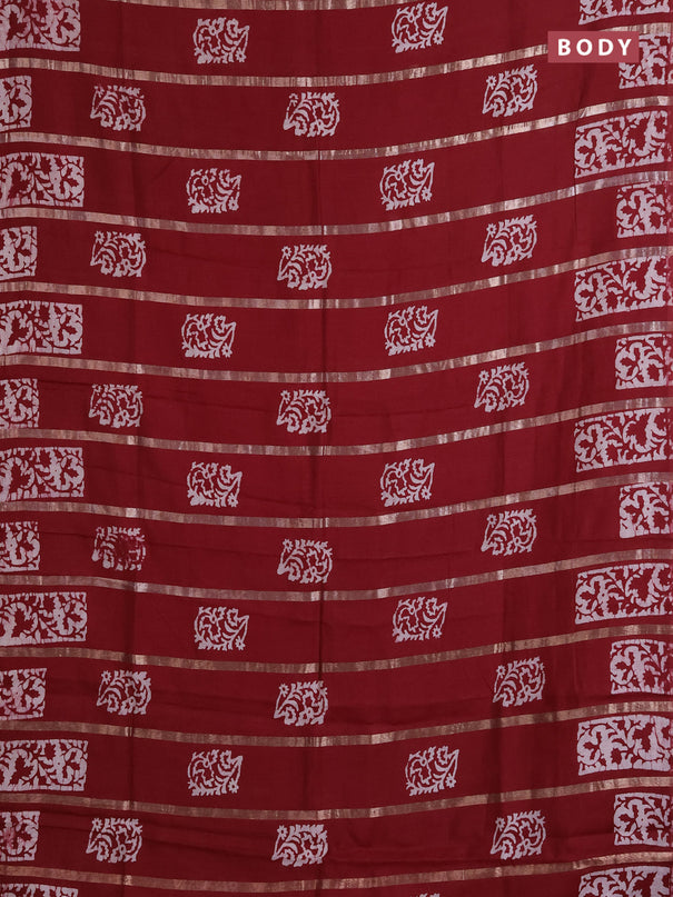Semi chanderi saree maroon with allover zari strips & batik butta prints in borderless style