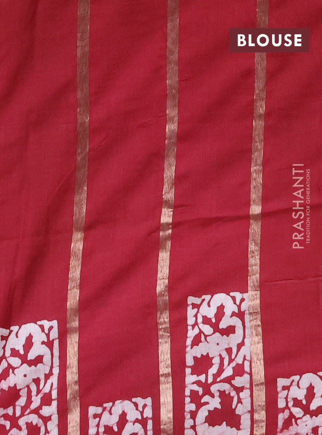 Semi chanderi saree maroon with allover zari strips & batik butta prints in borderless style