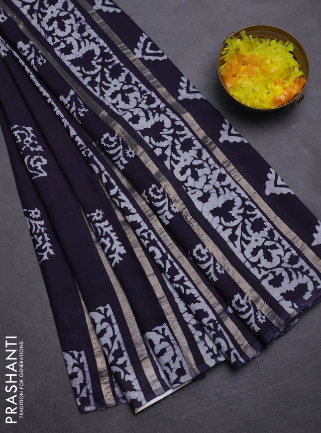Semi chanderi saree navy blue with allover zari strips & batik butta prints in borderless style