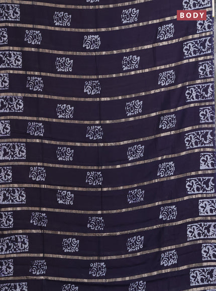 Semi chanderi saree navy blue with allover zari strips & batik butta prints in borderless style