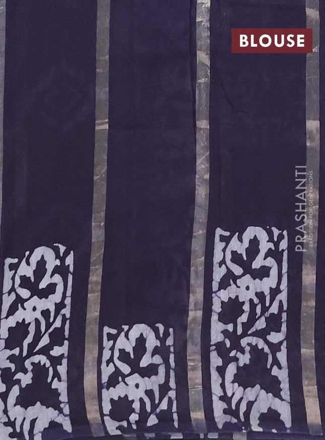 Semi chanderi saree navy blue with allover zari strips & batik butta prints in borderless style
