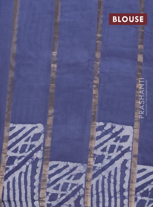 Semi chanderi saree dark grey with allover zari strips & batik butta prints in borderless style